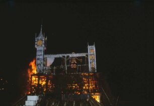 Parliament burning, with skeleton inside