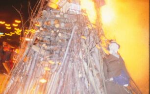 A bonfire with several effigies on