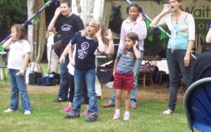Young people performing in the Old Rectory garden