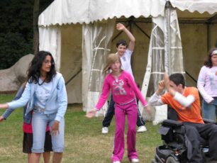 Young people performing in the Old Rectory garden