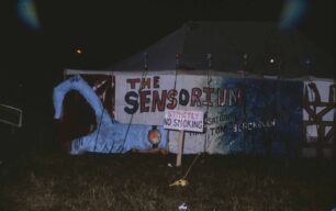The entrance to the Sensoria Mansion tent at night