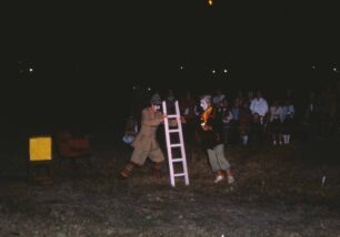 Two performers with a ladder