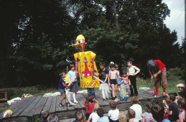 Children displaying a big costume