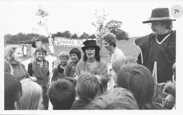 Carry and George interact with children