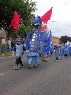 Large blue dragon parading (Wellsmead School)