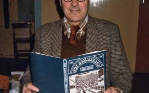 Bill West holding a copy of The Railwaymen - Wolverton