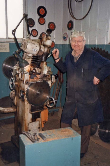Saw Doctor Jack Stimpson sharpening a circular saw blade