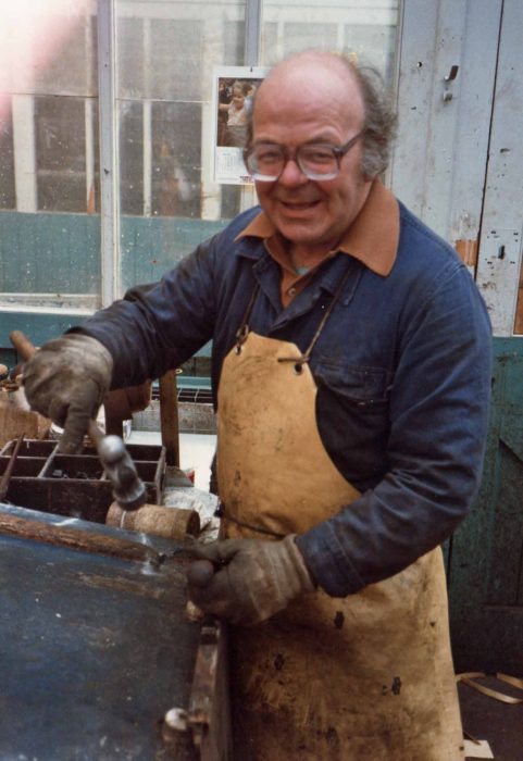 Fitter John Goodger repairing carriage door light mechanism
