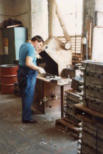 Dave Smith pouring white metal into a mould