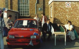 Shaun Waugh & Debbie Smythe beside competition prize car