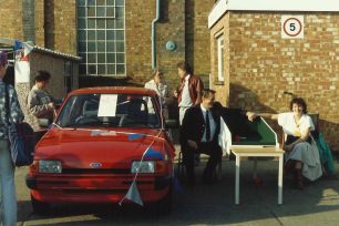 Shaun Waugh & Debbie Smythe beside competition prize car