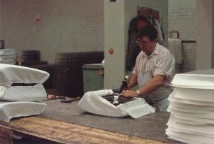 Trimmer Doug Jones working on a seat