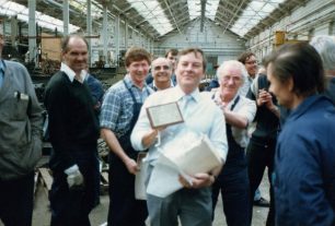 Foreman Phil Tansley with a plaque