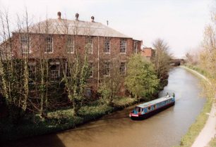 Old Works Stores offices on the canal bank near the station