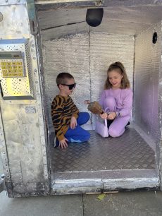 Children investigate the spacecraft in Margaret Powell Square