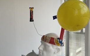 Polystyrene head with balloon