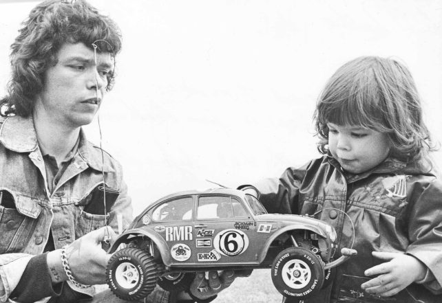 Father and daughter with radio-controlled car