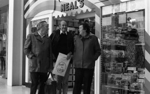 Three people leave Neal's toy shop
