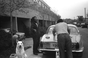 Fishermead - a man washes his car
