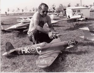 Man with large remote controlled model planes