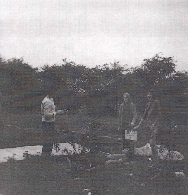 Four youths in garden