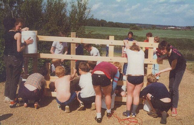 Club members assembling their raft