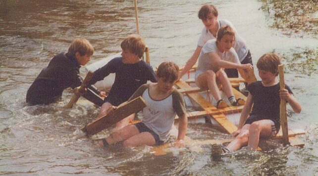 Youths hanging on to sinking raft