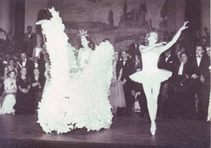 Ballerina with girl sitting on swan