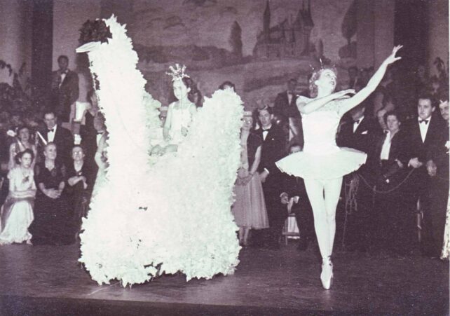 Ballerina with girl sitting on swan