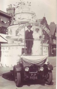 Carnival vehicle outside Cowlishaw's shop