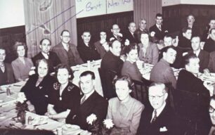 Gladys and Bert Weatherhead sitting at a dinner