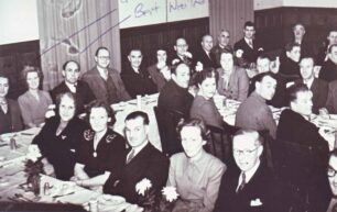 Gladys and Bert Weatherhead sitting at a dinner