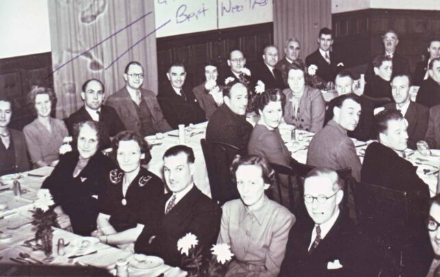 Gladys and Bert Weatherhead sitting at a dinner