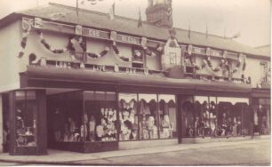 Cowlishaw shop front decorated for new King and Queen