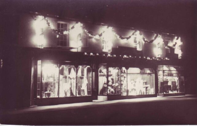 Cowlishaw`s shop display at night c1939