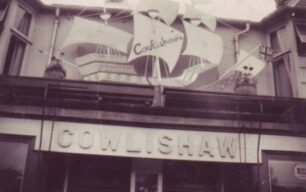 Cowlishaw's shop front with model boat above door