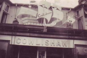 Cowlishaw's shop front with model boat above door