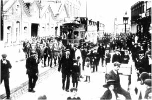 Men coming out of The Works, Stratford Road