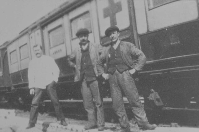 Men standing with the Ambulance train