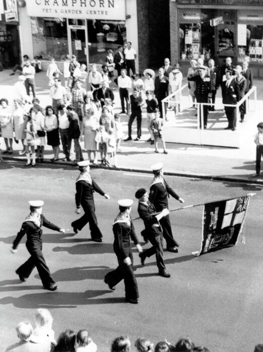 Officer taking salute from Royal Naval Association on Queensway - undated