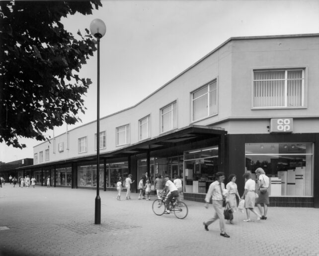 People outside & entering Queensway Co-Op, undated