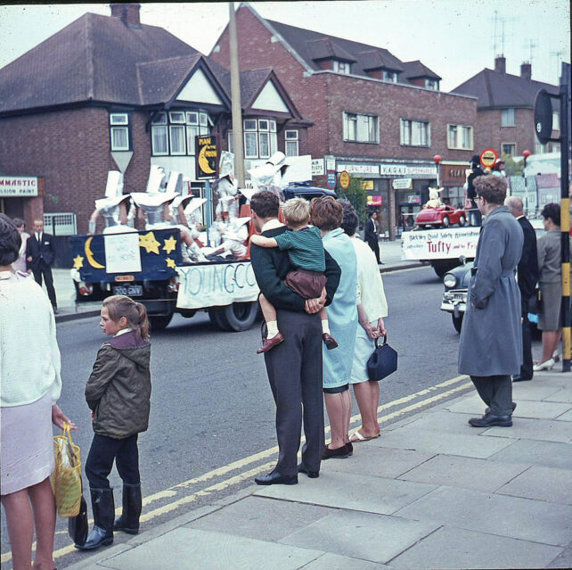 People watching Bletchley Carnival floats on Queensway - 1970s