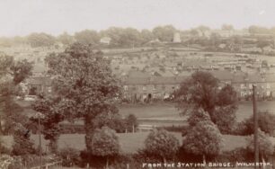 The windmill viewed from Station Road bridge Wolverton- undated