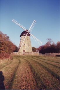 The windmill with a wooden palisade surround