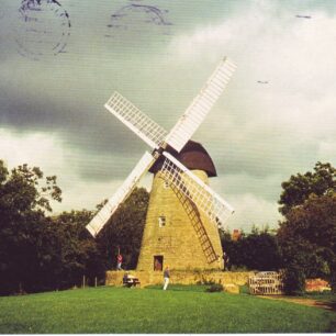 The picture side and obverse of a  franked postcard of the windmill 1982