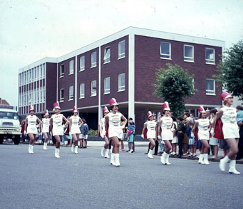 Marching girls in carnival parade in Queensway 1970s
