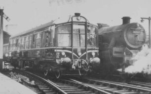 Railcar and Class 4 Tank in station, 1956