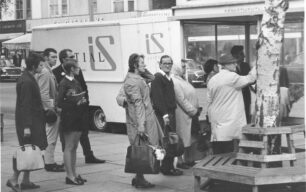 Boarding the bus opposite the Co-Op, undated