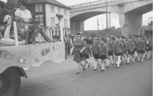 Girl Guides in carnival parade, undated