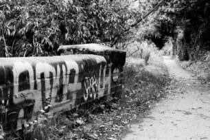 Graffiti on railway bridge stonework